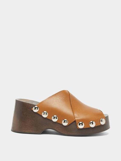 Ganni Brown studded leather clogs at Collagerie