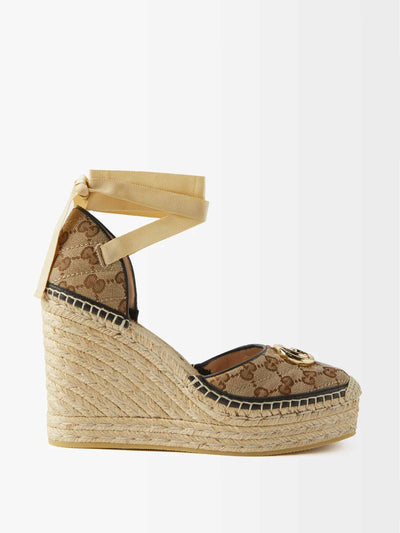 Gucci Beige canvas and raffia wedge sandals at Collagerie
