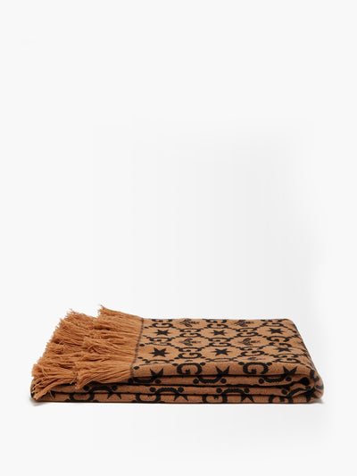 Gucci GG-monogram jacquard blanket at Collagerie