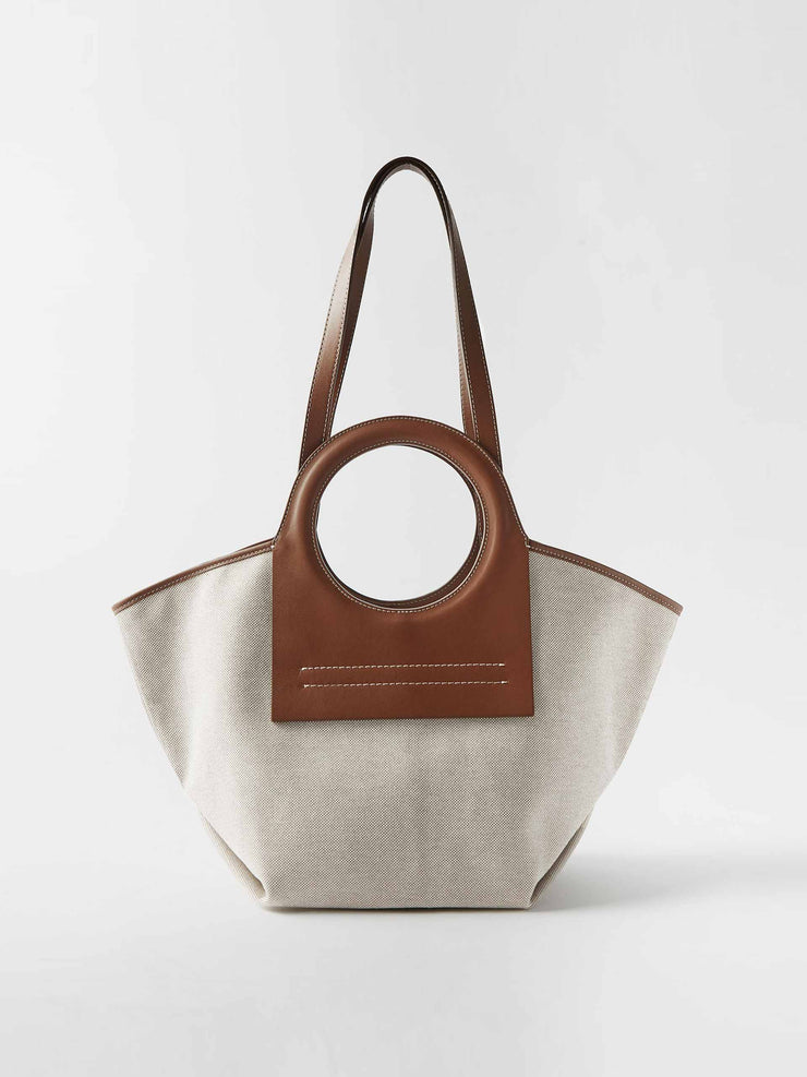 Natural canvas and brown leather tote bag