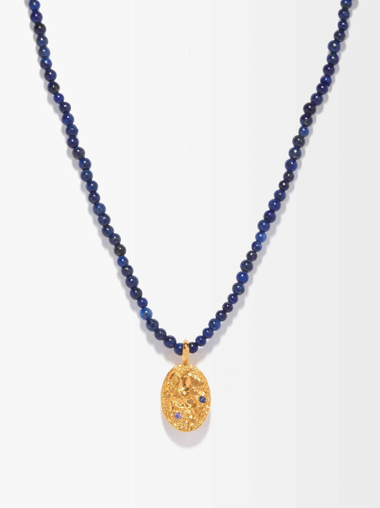 Blue beaded necklace with a gold vermeil pendant