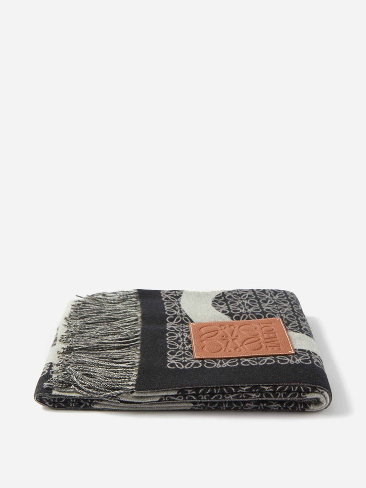 Anagram-debossed wool-blend jacquard blanket
