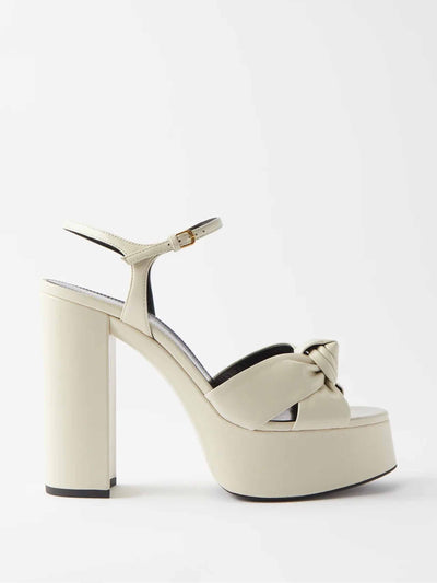 Saint Laurent Knotted off white leather platform sandals at Collagerie