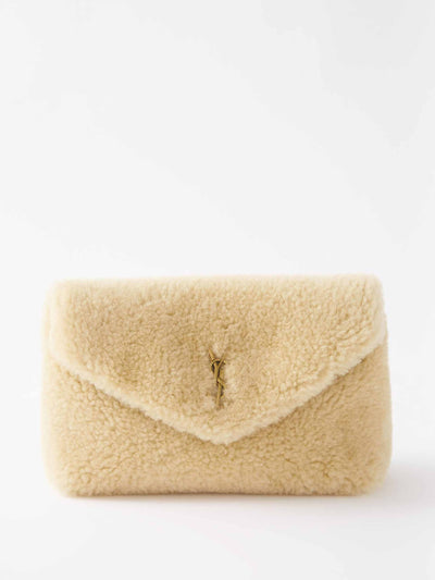 Saint Laurent Puffer YSL-logo padded shearling pouch at Collagerie