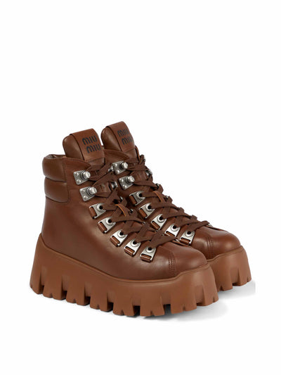 Miu Miu Leather platform hiking boots at Collagerie