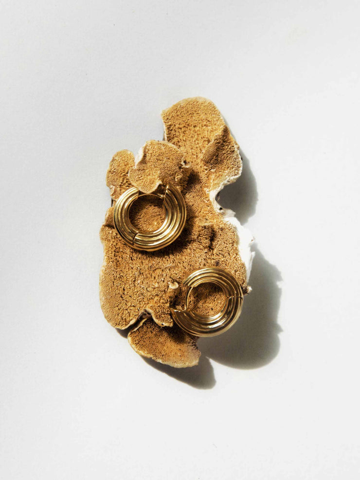 Medium gold non-conformist hoops