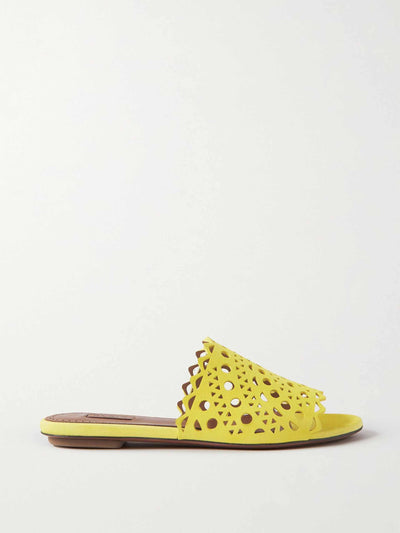 Alaïa Yellow suede slides at Collagerie