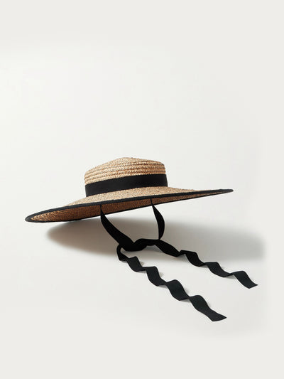 Gigi Burris Straw hat with black trim at Collagerie