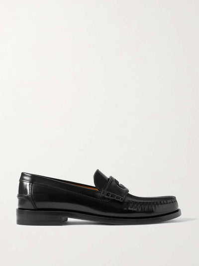 Gucci Black leather loafers at Collagerie