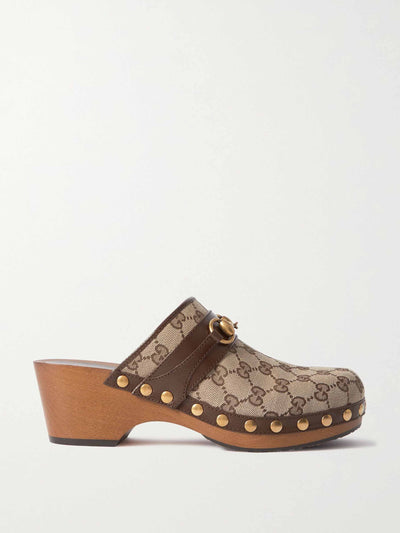 Gucci Monogram canvas clogs at Collagerie