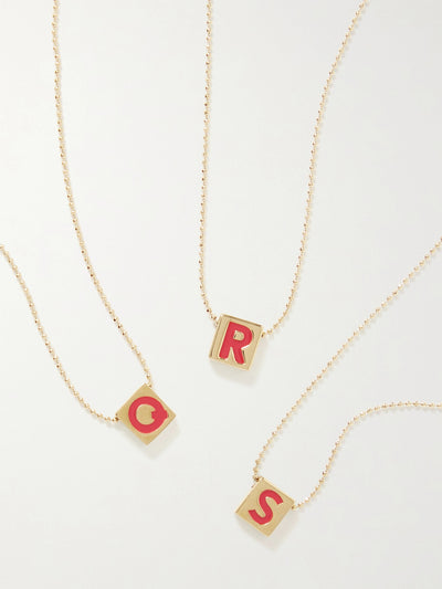 Roxanne Assoulin Initial This gold-plated and enamel necklace at Collagerie