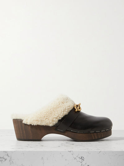 Saint Laurent Le Maillon embellished shearling-trimmed leather clogs at Collagerie