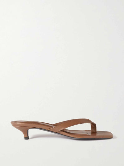 Totême Brown leather flip flops at Collagerie