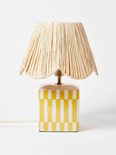 Oliver Bonas Yellow raffia and ceramic table lamp at Collagerie