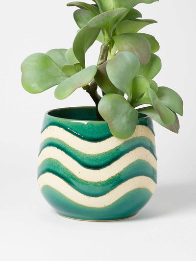 Oliver Bonas Green glaze plant pot at Collagerie