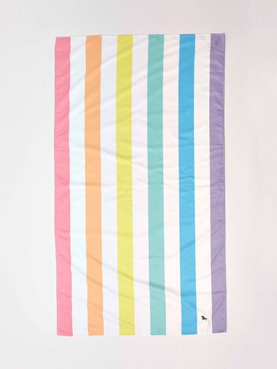 Oliver Bonas Rainbow striped beach towel at Collagerie