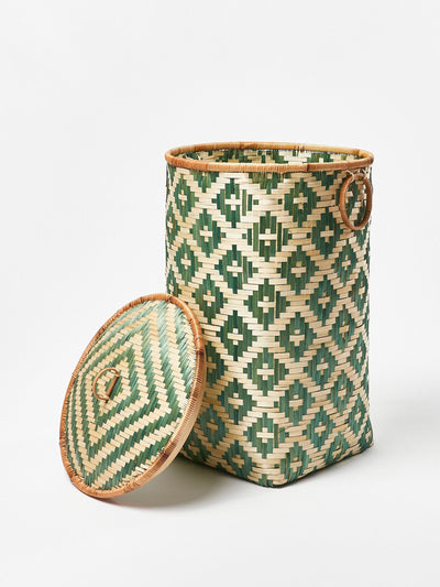 Oliver Bonas Woven bamboo laundry basket at Collagerie