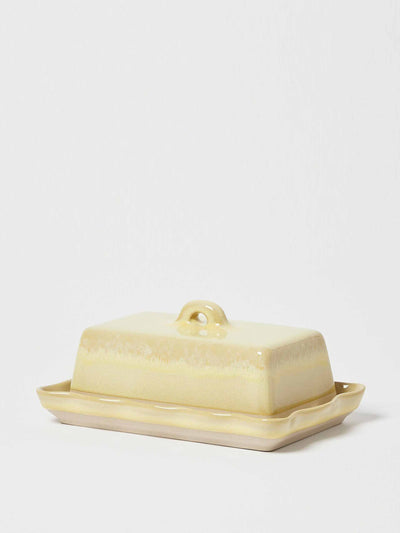 Oliver Bonas Yellow ceramic butter dish at Collagerie