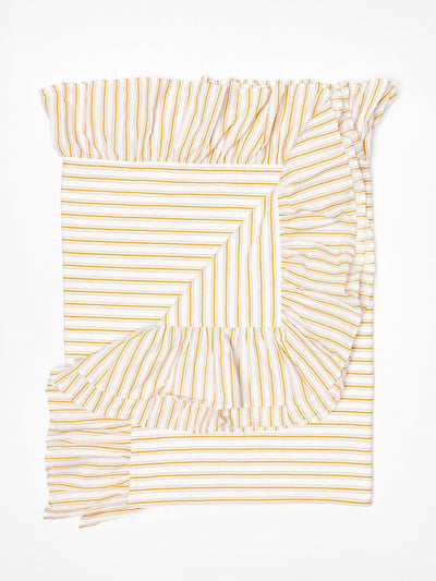 Oliver Bonas Yellow striped tablecloth at Collagerie