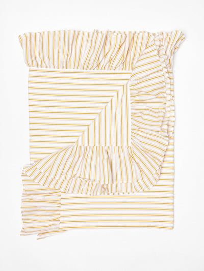 Oliver Bonas Yellow striped tablecloth at Collagerie