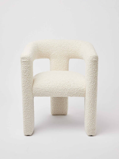 Oliver Bonas Tress faux sheepskin boucle chair at Collagerie