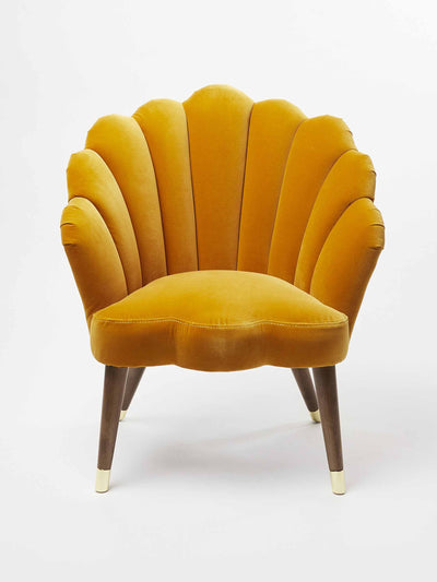 Oliver Bonas Scalloped mustard armchair at Collagerie