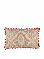 Red and orange ikat and stripe cushion with red wavy trim