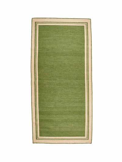 Pentreath & Hall Natural and green boarders rug at Collagerie