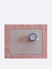 Set of two pink and white jacquard linen placemats