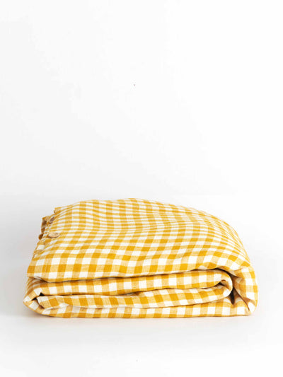 Poppy and Honesty Yellow gingham linen bedding set at Collagerie