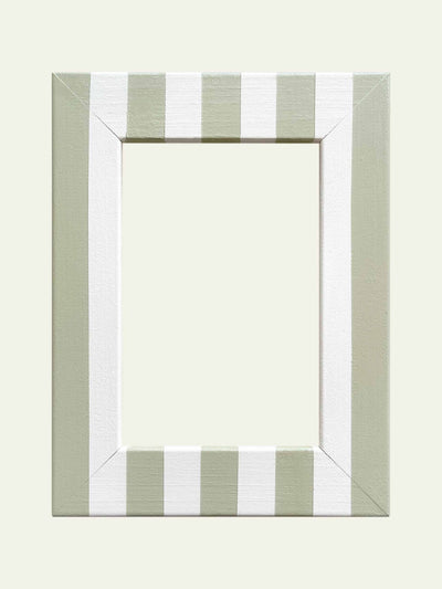 Quinn Says Green and white striped frame at Collagerie