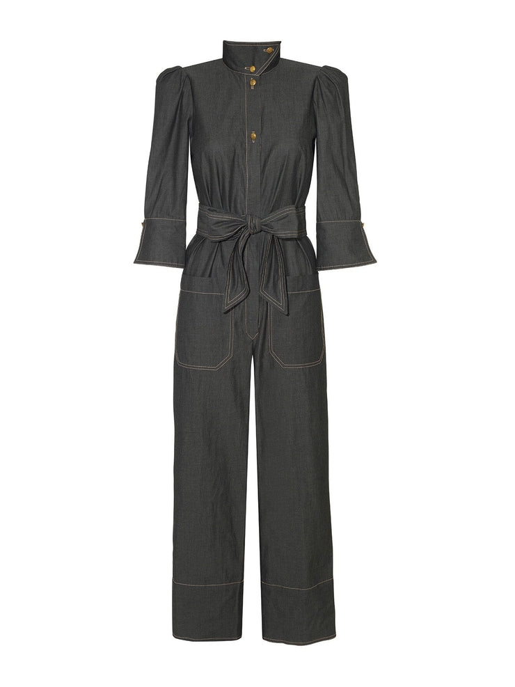 A lightweight Anna Mason jumpsuit, tightened with a matching belt to a bow, that&