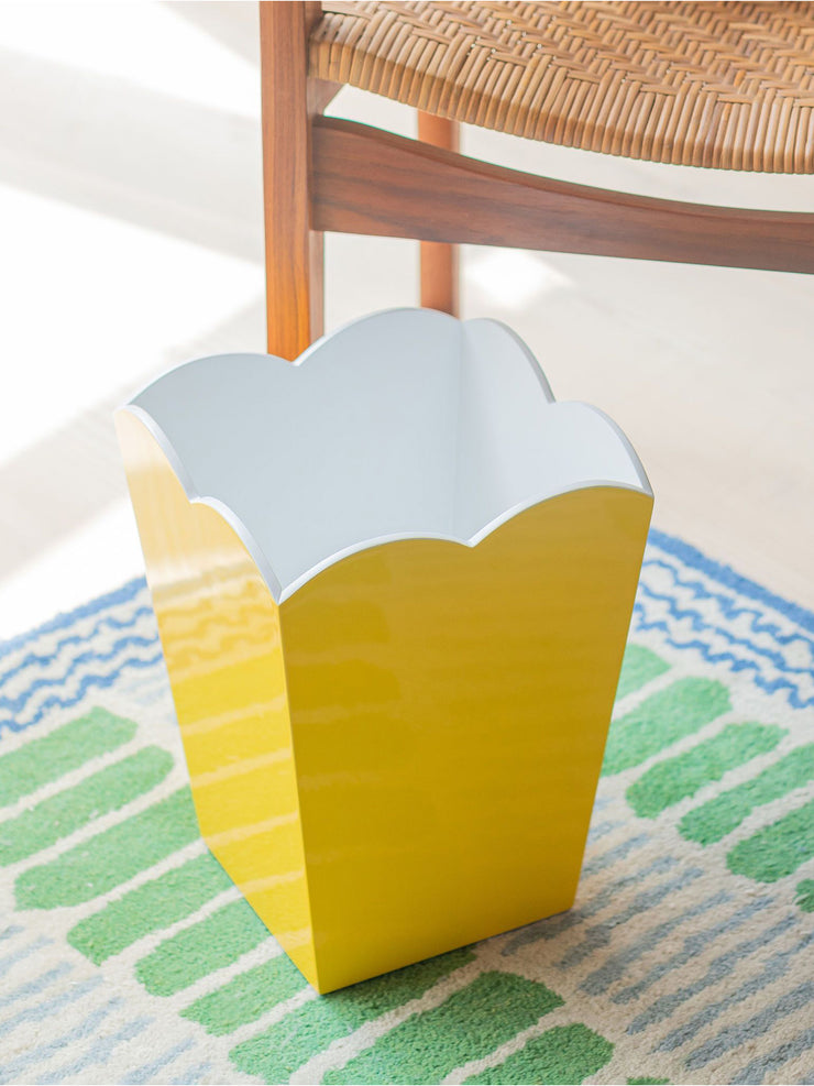 Beautiful scalloped yellow waste paper bins by Addison Ross. Finished in 20 coats of high gloss lacquer with a white matt interior | Collagerie.com