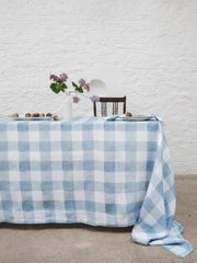 Checkmate. Cheerful and unassuming, The Sette's Blue Gingham Tablecloth is perfect for meals indoors and out. Collagerie.com