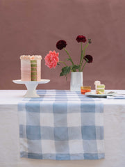 Checkmate. Cheerful and unassuming, this runner is perfect for meals indoors and out. Collagerie.com