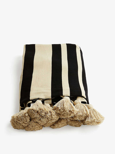 Soho Home Black and cream striped rug with tassels at Collagerie