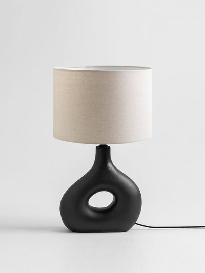 Sklum Ceramic curved table lamp at Collagerie