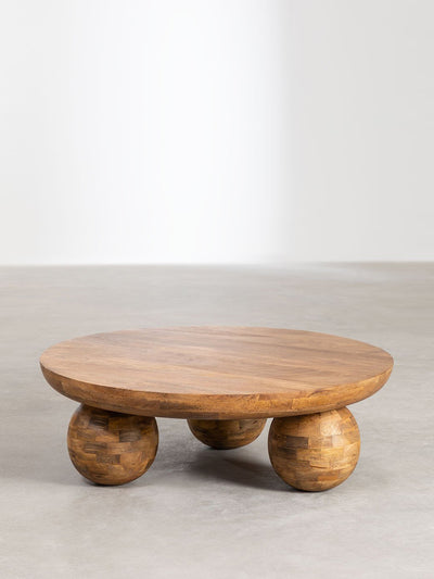 Sklum Mango wood round coffee table at Collagerie