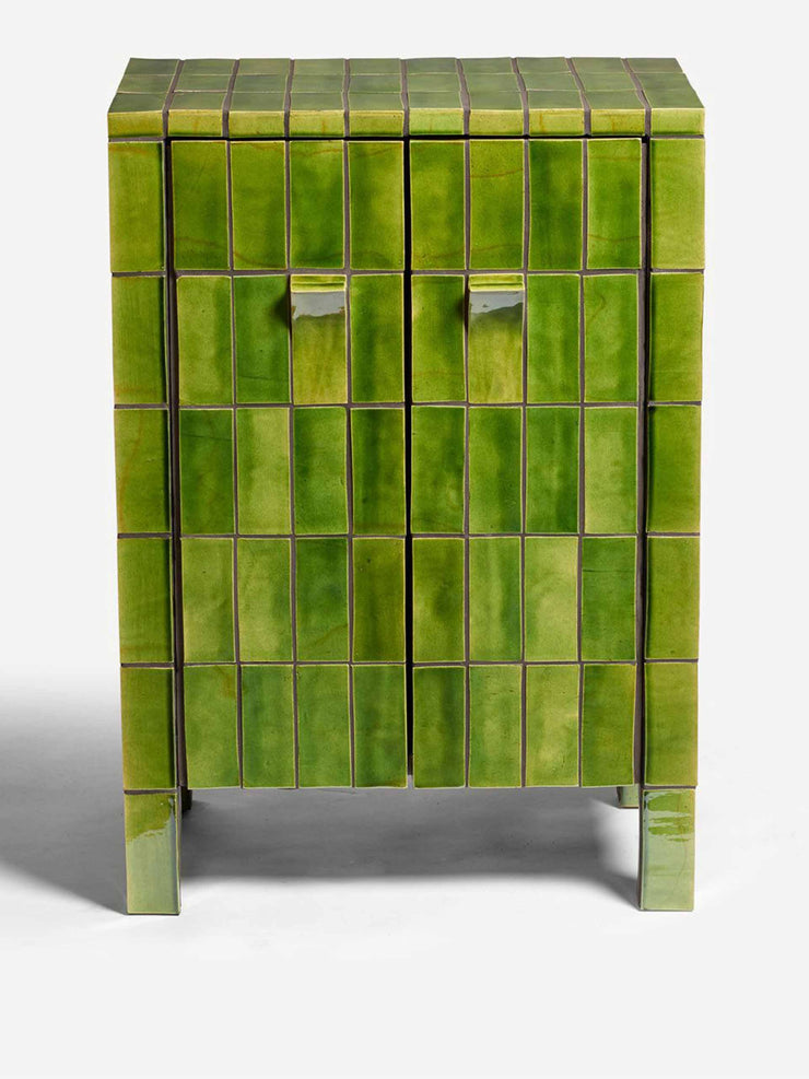 Vibrant green tile clad cabinet