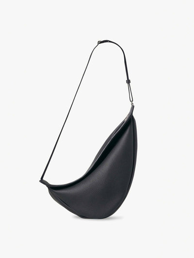 The Row Black leather Banana bag at Collagerie