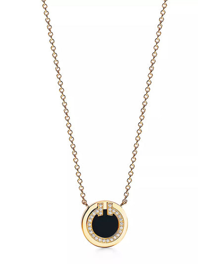 Tiffany & Co Diamond and black onyx circle pendant at Collagerie