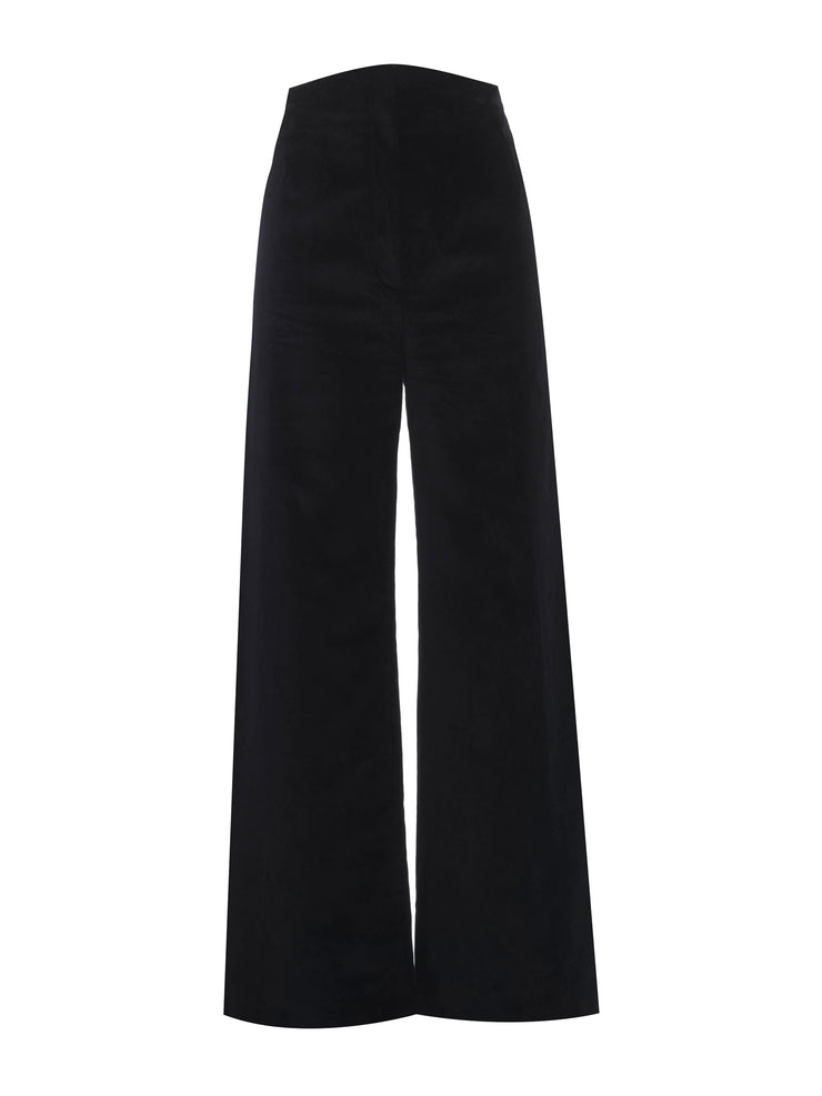 High-waisted wide leg black velvet Anna Mason trousers. The ideal goes-with-everything capsule wardrobe number. Collagerie.com