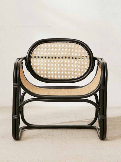 Urban Outfitters Lounge rattan and wood chair at Collagerie