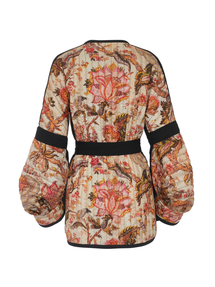 A quilted Anna Mason jacket inspired by an antique piece of fabric printed on both silk and cotton to retain an antique look. Collagerie.com