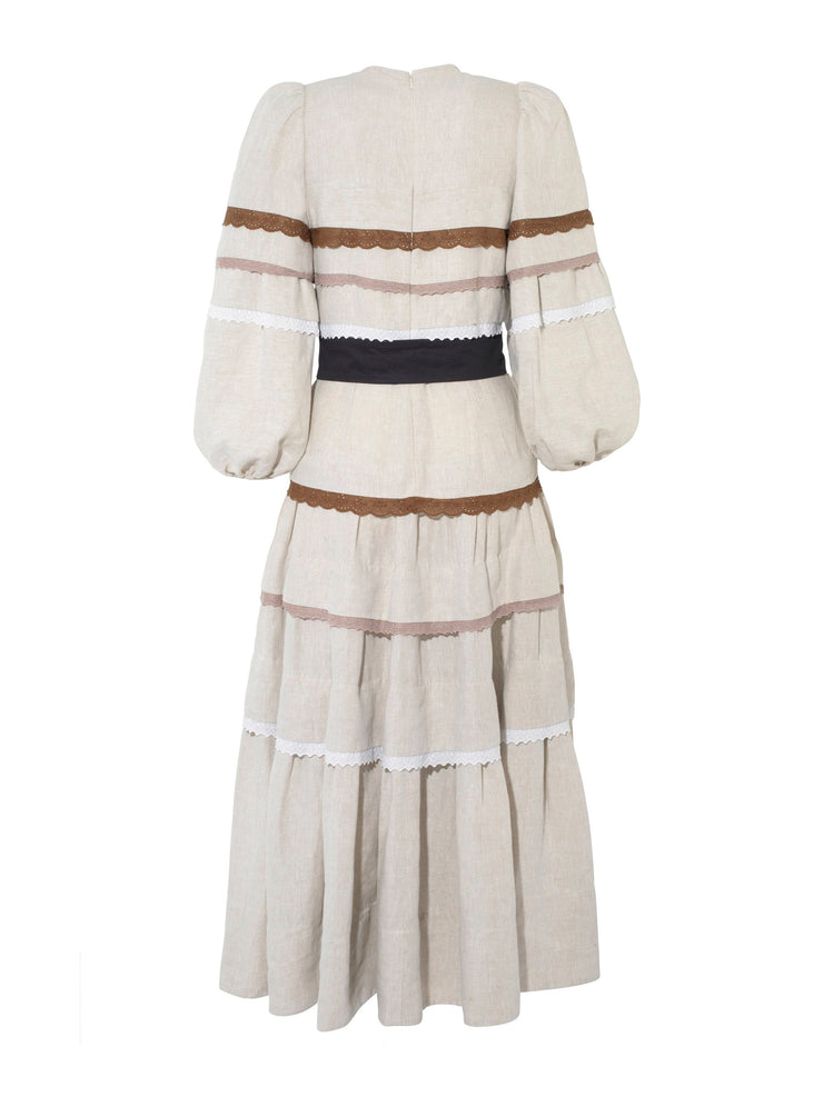 A tiered linen Anna Mason dress with broidery cotton lace details, perfect for a boho-smart day or night look. Collagerie.com