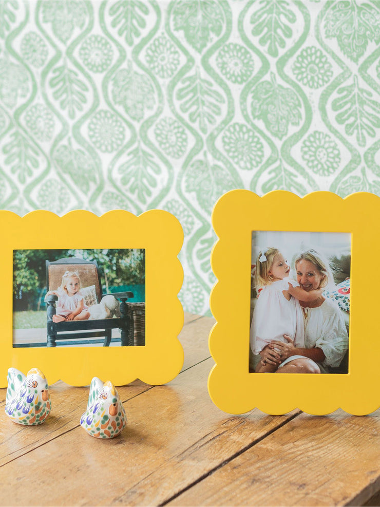 Addison Ross yellow scalloped photo frame in high gloss lacquer. Clean with a soft dry cloth. Overall size is 23 x 28cm, suitable to fit a 5 x 7" in photo | Collagerie.com