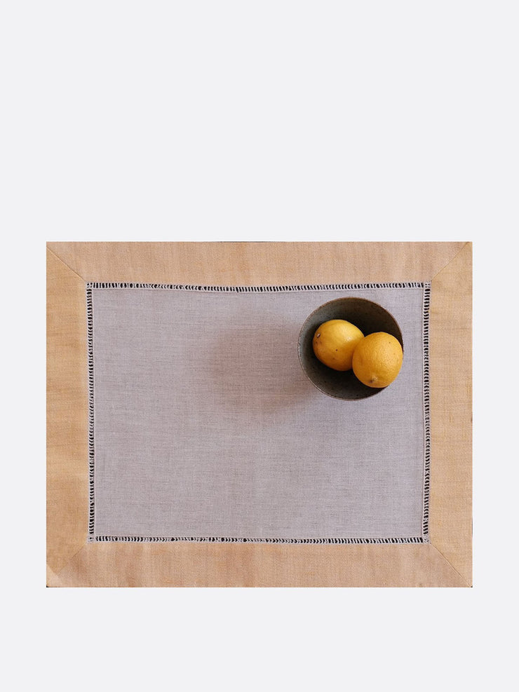 Set of two yellow and white jacquard linen placemats